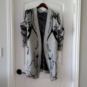 Beautiful woman face knee length cardigan